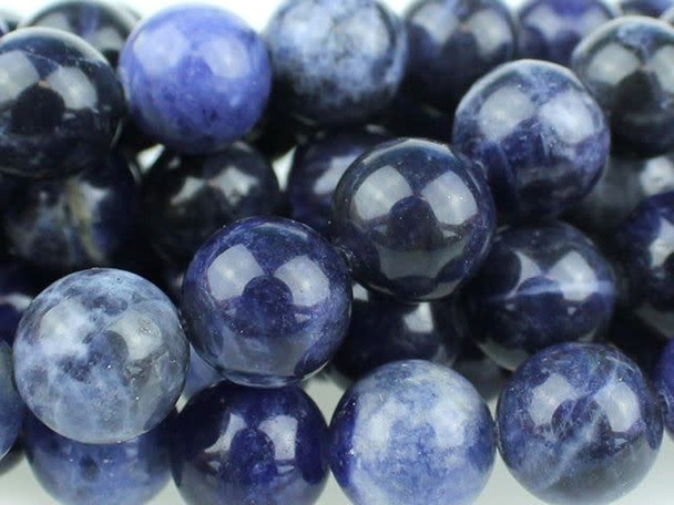 Put eye-catching style into your designs with the Dakota Stones 10mm sodalite round beads. Available by the strand, these beads feature a perfectly round shape full of classic style that will work anywhere. They are bold in size, so showcase them in long necklace strands or outstanding bracelet designs. These beads feature dark blue color with hints of cloudy white and gray. Use these gemstone beads to add rich style to your designs.Because gemstones are natural materials, appearances may vary from piece to piece. Each strand includes approximately 20 beads.