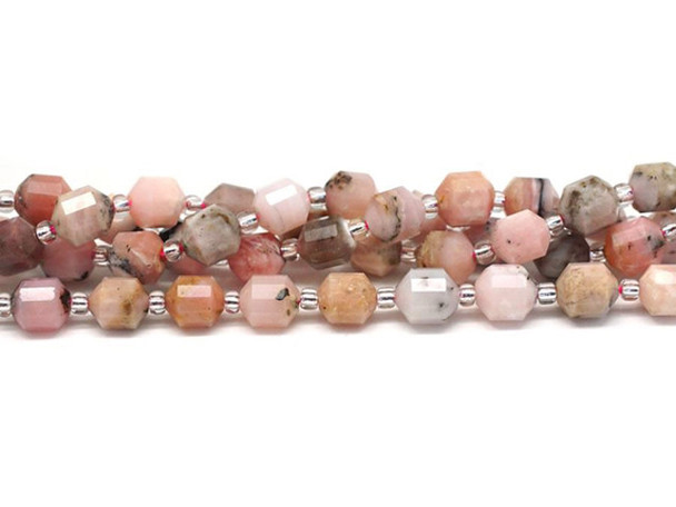 Energize your designs with this Dakota Stones pink opal faceted 6mm energy prism bead strand. The beads on this strand feature a faceted cut helping them catch the light. This strand features spacers between each of the beads, so you could use it as-is, or string the beads into a design. Pink Opal is a variety of non to precious opal, meaning that it has lustre and some translucency without the fire or color play associated with precious opal varieties. Pink Opal naturally occurs in shades of extremely pale to deeper pink. Metaphysically, Pink Opal is said to aid in the productivity of new endeavors. Because gemstones are natural materials, appearances may vary from bead to bead.