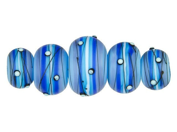 Indulge in your arctic-inspired fantasies with the Arctic Blast Graduated Roundel Bead Strand from Grace Lampwork. These gorgeous glass beads, handmade and slightly varying in appearance, present an array of stunning blue frosted tones that are bedazzled with black lines and icy dots. Imagine designing with this bundle of wintery goodness, using them to create a matching jewelry set or incorporating them into a necklace or bracelet for fabulous results. With their roundel shapes and graduated sizes ranging from 13 x 9mm to 19 x 12mm, these beads bring versatility in their ability to charm and delight. String them with leather or ribbon for the ultimate, personal touch.