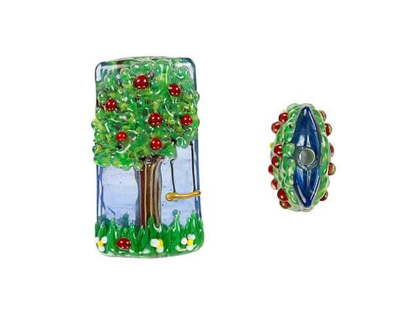 Showcase the beauty of nature in your designs with this Grace Lampwork bead. This bold focal bead is rectangular in shape and features a puffed dimension, so it's sure to stand out in your style. It features a raised design of an apple tree full of red apples and green leaves, with a swing hanging from its branches. The design is featured on both sides of the bead, so it will look great from any angle. String this bead onto a head pin to turn it into a pendant, or string it in an asymmetrical necklace design. This item is handmade, so appearances may vary.