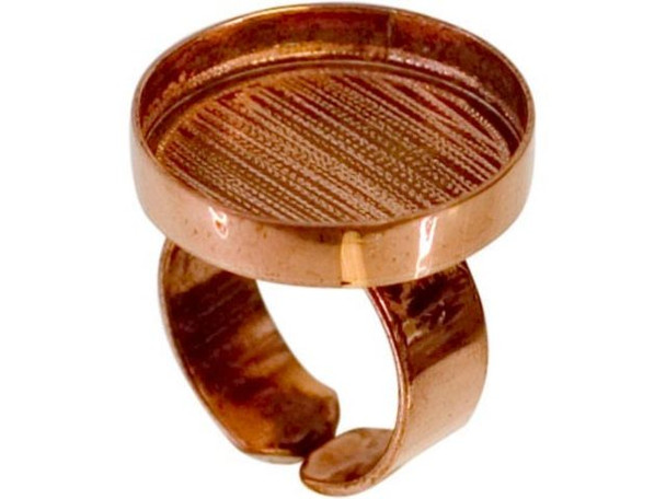 This bezel-cup ring is made of solid, raw copper, so you can antique it with liver of sulphur, or clean it with PennyBrite or other copper cleaners.    See Related Products links (below) for similar items and additional jewelry-making supplies that are often used with this item.