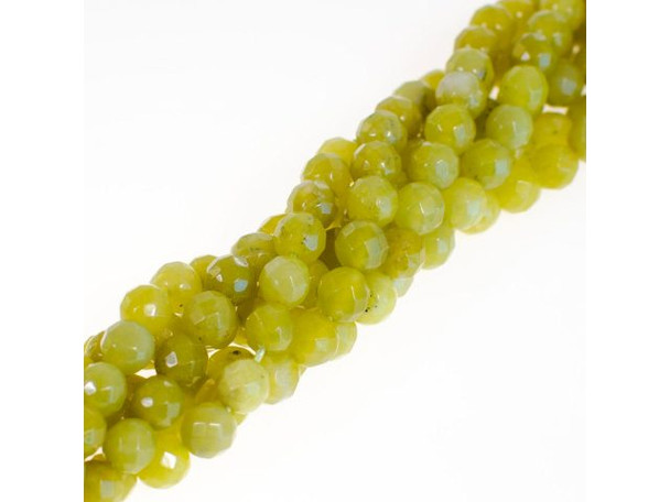 Olive Jade: Yellowish-green olive jade is occasionally called peridot stone due to its color (not because of any relationship to that gemstone). Olive jade is actually a form of serpentine, and is not a "true" jade. These semiprecious beads and donuts are softer and less dense than most real jade.Historically, serpentine was thought to protect the wearer from snake bites. Modern mystics say it has the power to restore self-confidence, dispel fear, enhance meditation, and balance female hormones.Please see the Related Products links below for similar items, and more information about this stone.