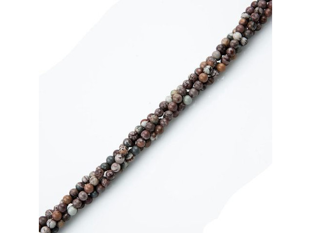 Our Sonora Jasper beads have striking desert-landscape patterns in subtle desert colors of red, brown, tan, cream and gray-blue. The tracks and circles on these beads are reminiscent of the famed "canals" on Mars, as well as dentritic sun-dried waterways on Earth. Our beads are not as vivid in hue as classic Sonora Sunrise or Sonora Sunset, but what they lack in hue, they make up for in dramatic patterns. Jaspers stones are believed to carry a strong connection to the Earth's energy, making jasper a helpful stone for grounding, stability and strength.Find related items below, and find out more about jasper in our Gemstone Index.