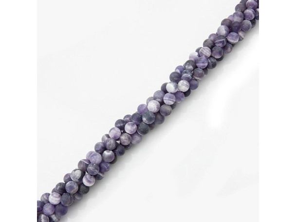 Cape Amethyst beads are cut from amethyst that is layered or striped with milky quartz that forms attractive patterns in the stone. This semiprecious gemstone is usually translucent and ranges in color from light purple to medium purple. Our cape amethyst beads are created by Mother Nature, so keep in mind that the bead strands you buy will not have identical patterns to the strand pictured in our secure online store. Amethyst is said to instill high ideals and urge one to do what is right. These semiprecious beads are also said to cure impatience, balance high energy, eliminate chaos, and help keep one grounded. To help your cape amethyst gemstone beads maintain their full purple hues, do not store them in direct sunlight. Please see the Related Products links below for similar items, and more information about this stone.