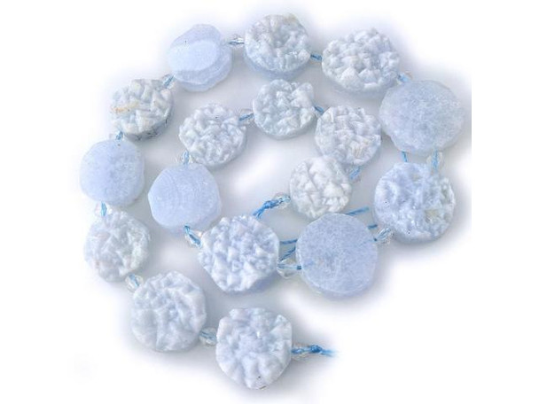 Blue Lace Agate gemstone beads add a soothing baby blue hue to the gemstone palette, displaying subtle light blue bands in lacy and wavy patterns. Just keep in mind that gemstones are made by Mother Nature, and each gemstone bead will be unique. This pastel blue gemstone is said to lighten situations and nurture maternal impulses. In traditional Eastern practice, blue lace agate is linked to the throat chakra, and is worn to help calm overactive thyroid and parathyroid glands, as well as assist in clear and confident communication.  Please see the Related Products links below for similar items, and more information about this stone.