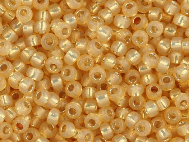 TOHO Glass Seed Bead, Size 6, Silver-Lined Milky Lt Topaz (Tube)