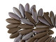 Add contemporary style with the CzechMates glass 16 x 5mm matte chocolate brown bronze Vega two-hole dagger beads. These beads feature a dagger shape with two stringing holes at the top of the bead. They can dangle from designs or stand out in seed bead embroidery. The two stringing holes even allow you to add them to multi-strand looks. You will have even more design possibilities when you use these beads in your projects. They feature rich brown color dusted with a silver-gray sheen. 