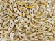 Bring earthy accents to designs with these CzechMates crescent beads. These flat beads feature a crescent shape, like a moon. Two stringing holes run through the center of each shape, so you can add them to designs in unique ways. Layer them with other beads in bead weaving or use them to add dimension to stringing projects. They would make interesting elements in bead embroidery. They feature mottled beige and brown tones. 