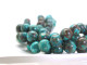 Bring gemstone style to your designs with this Dakota Stones blue sky jasper 10mm round bead strand. These beads feature a classic round shape and a vibrant blue color mixed with greens and browns. Their 10mm size will make them stand out in your projects. Because gemstones are natural materials, appearances may vary from piece to piece.