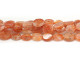 Decorate your jewelry designs with the gemstone style of these Dakota Stones beads. Sunstone, a variety of Feldspar, is aptly named for its shades of gold, orange, red and brown, as well as its iridescent sparkle. As the stone catches the light, inclusions of Goethite or Hematite refract the light between the layers of the crystal, producing the effect of the stone seeming to shine from within. The beads on this strand can vary in size from about 8 x 10mm to 10 x 12mm. Because gemstones are natural materials, appearances may vary from bead to bead.