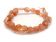 Decorate your jewelry designs with the gemstone style of these Dakota Stones beads. Sunstone, a variety of Feldspar, is aptly named for its shades of gold, orange, red and brown, as well as its iridescent sparkle. As the stone catches the light, inclusions of Goethite or Hematite refract the light between the layers of the crystal, producing the effect of the stone seeming to shine from within. The beads on this strand can vary in size from about 8 x 10mm to 10 x 12mm. Because gemstones are natural materials, appearances may vary from bead to bead.