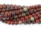 Delicious style can be yours with the Dakota Stones 4mm Apple Jasper round beads. These beads are perfectly round in shape, so they will work in any classic style. They are small in size, so use them as spacers. Try them as pops of color in earring designs. These beads feature the rich and juicy colors of fresh apples hanging from a tree. Deep red mingles with hints of leafy green and bark brown. Pair them with earthy colors for a pleasing display. Jasper is an opaque variety of quartz, with a microscopic crystalline structure. Metaphysical Properties: Jasper is thought to improve vision and protect from unseen dangers at night.Because gemstones are natural materials, appearances may vary from piece to piece. Each strand includes approximately 52 beads.