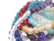 This Dakota Stones Chakra Stones 6mm Large Hole Round Bead Strand contains 8 different varieties of gemstones representing the different Chakras. The included gemstones are Amethyst, Lapis, Blue Apatite, Green Aventurine, Citrine, Carnelian, Red Garnet and Crystal Quartz.  Their large hole makes them easy to use with thicker stringing materials. Each strand includes approximately 64 beads, with about 8 in each color. Size: 6mm Hole Size: 1.5mm