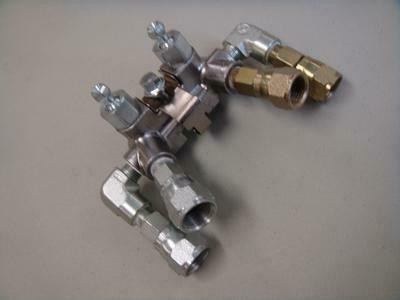 Graco Fusion AP Fluid Manifold Coupling Block, 4-hose (includes 12a, 12b, 12d-12g)