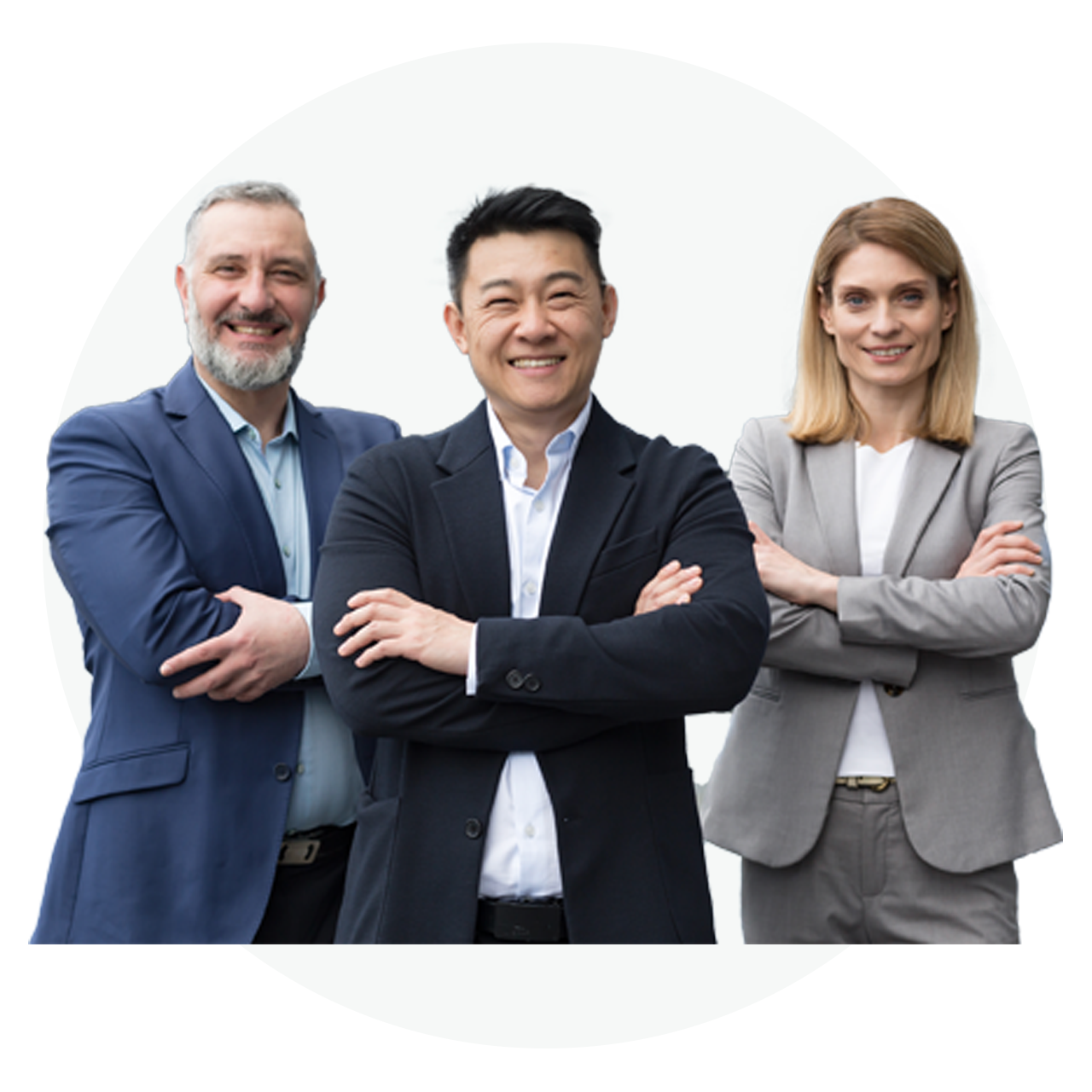 Three business professionals standing confidently with arms crossed in business attire.