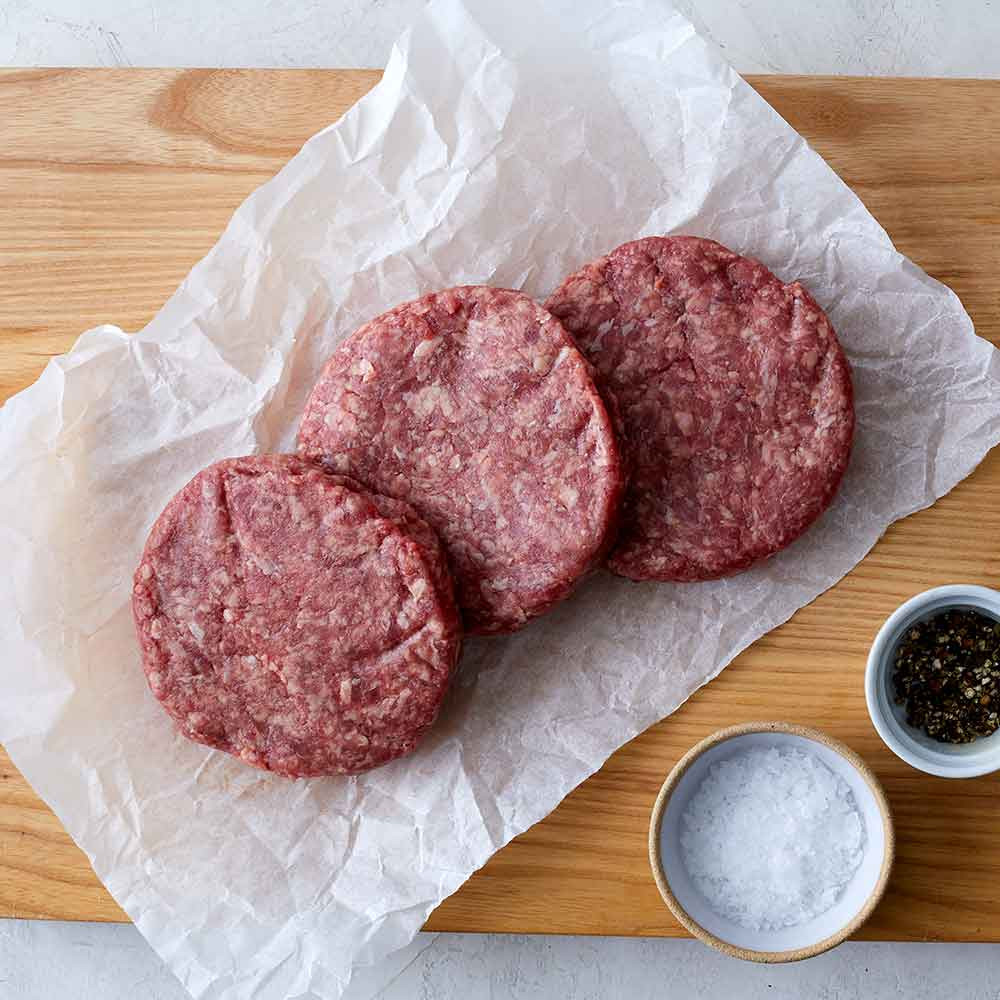 Three ground beef patties.