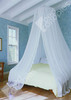 Silk round bed canopy draped over a Queen bed lifestyle view