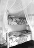 Cotton single mosquito net box over a bunk bed