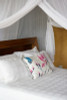 Cotton mosquito net box corner and hem detail close-up