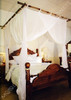 Cotton box mosquito net suspended on bamboo frame