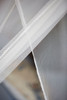 Mosquito net box overlocked opening hem detail close-up