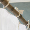 Box mosquito net hung from a bamboo frame