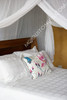 Cotton mosquito net opening overlap detail close-up