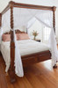 Cotton box mosquito net over a King size bed