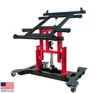 Multi-position panel assembly table with electric tilting and height adjustment raised.