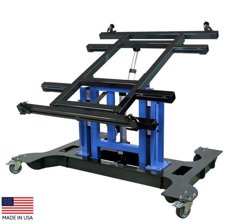 Multi-position panel assembly table with electric tilting and height adjustment lowered.