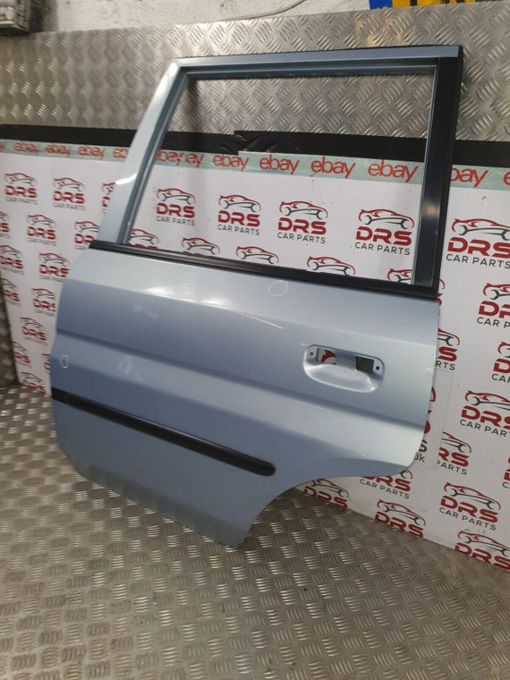 MAZDA DEMIO DOOR (BARE) PASSENGER REAR NSR IN BLUE 1996 - 2002