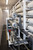 Detail of the Pentair Codeline pressure vessel end caps and the duplex stainless high-pressure manifold on the ForeverPure membrane rack