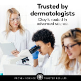 3 scientists observing a microscope. Trusted by dermatologists. Olay is rooted in advanced science.