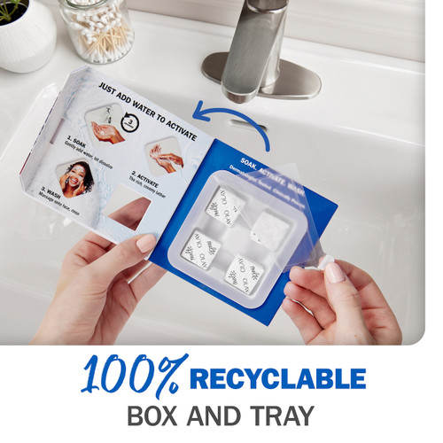 Model holding and open Cleansing Melts box in hands. 100% recyclable box and tray.