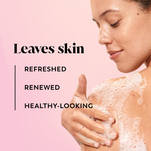 Model posing lathering body wash on skin. Leaves skin refreshed , renewed, healthy looking.
