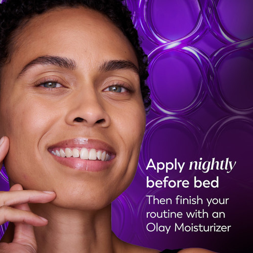 Model posing. Apply nightly before bed. Then finish your routine with an Olay moisturizer.
