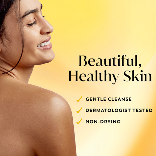 Model posing and smiling showing glowing skin. Beautiful, healthy skin. Gentle cleanse, dermatologist tested, non drying