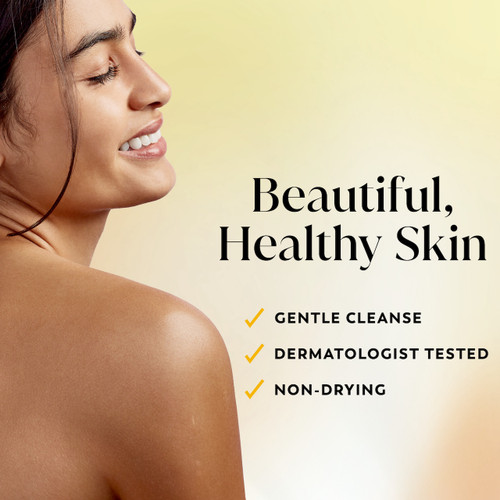 Model posing and smiling showing glowing skin. Beautiful, healthy skin. Gentle cleanse, dermatologist tested, non drying
