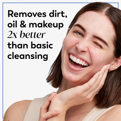 Model posing with hand on face smiling. Removes dirt, oil and makeup 2x better than basic cleansing