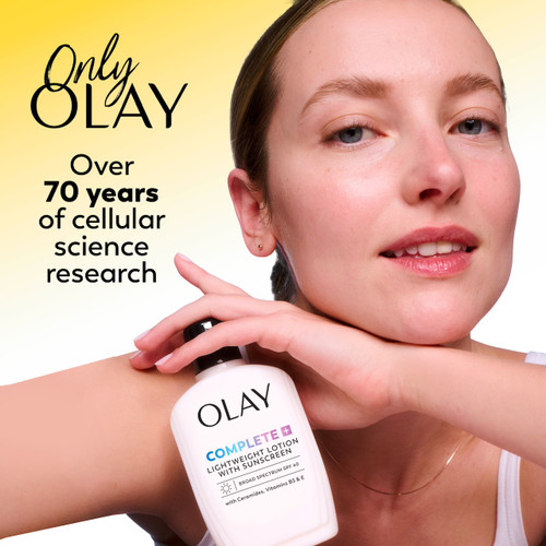 Model posing with Olay Complete bottle in hand. Only Olay. Over 70 years of cellular science research. Model posing with Olay Complete bottle in hand. Only Olay. Over 70 years of cellular science research.