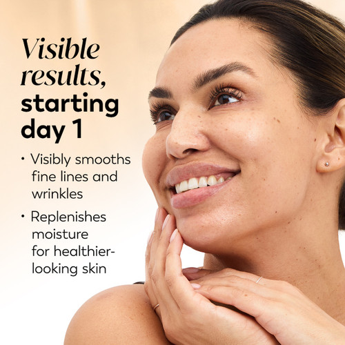 Model posing and smiling. Real results starting day 1. Visibly smooths fine lines. Replenishes moisture for healthier looking skin