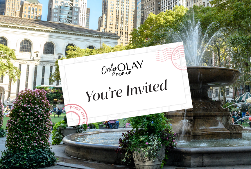 Bryant Park fountain terrace with a post card styled letter invitation on topto the Only Olay Pop-up event