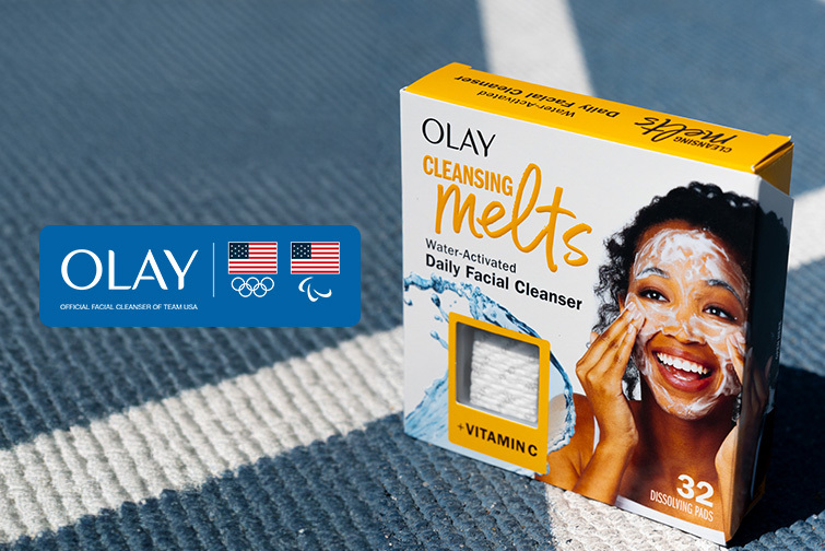 Can OLAY and Olympics logo beside a box of the new Olay Cleansing Melts + Vitamin C