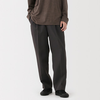 Herrenhose aus Polyester‐Twill mit weitem Bein und Bundfalte