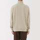 Herren‐Doppelstrickpullover mit halbem Reißverschluss.
