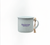 white mini campfire mug ornament finished with a speckled powder coating, this mini mug ornament has "Houghton University" on the side and includes rustic twine for easy hanging