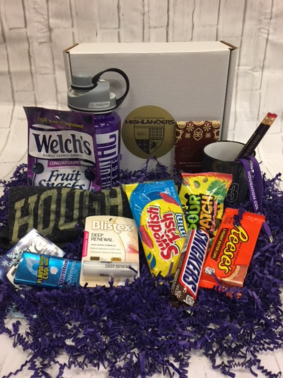 care package box with t-shirt, water bottle, chapstick, and assorted candy