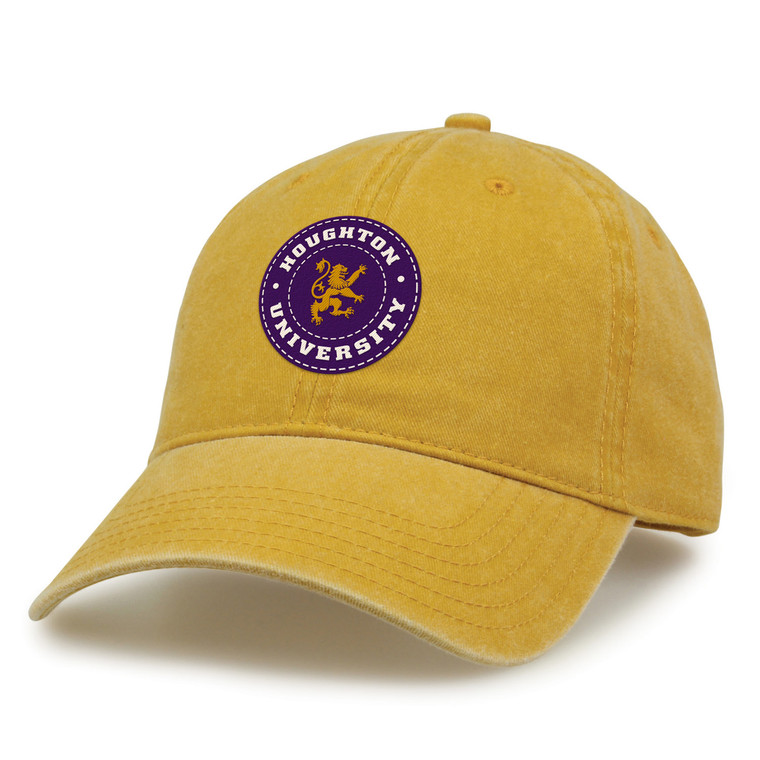 Mustard yellow hat with purple circle patch embroidered with Houghton University and rampant lion in the middle