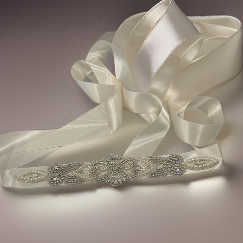 Waistband- w/ pearl & rhineston bow, oval design on cream ribbon