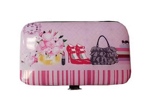 Manicure set- High heel shoes, purse and flowers on pink background